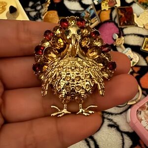 Elegant Gold and Red Peacock Brooch